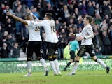 Darren Bent of Derby is congratulated after scoring during the FA Cup fifth round tie between Derby County and Reading at iPro Stadium on February 14, 2015