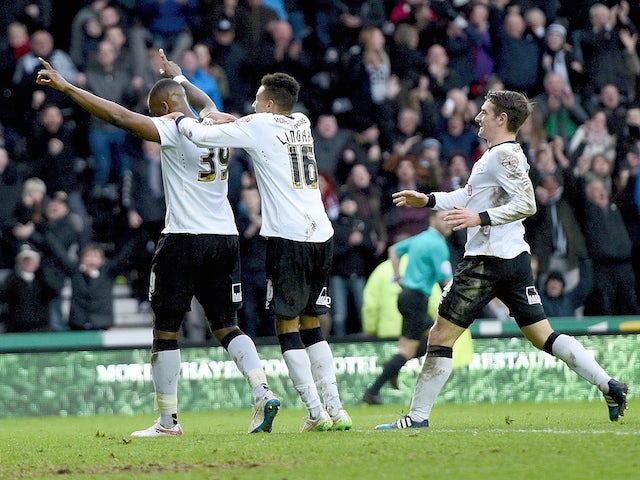 Darren Bent of Derby is congratulated after scoring during the FA Cup fifth round tie between Derby County and Reading at iPro Stadium on February 14, 2015