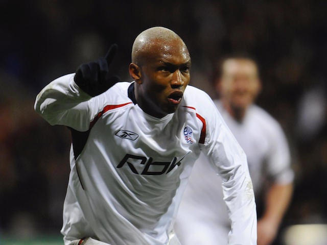 Bolton's El hadji Diouf celebrates after scoring to make it 1-0 against Athletico Madrid during tonight's UEFA cup match at The Reebok Stadium in Bolton on February 14, 2008