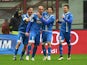Empoli's forward Massimo Maccarone celebrates with teammates after scoring a goal during the Italian Serie A football match between AC Milan and Empoli at San Siro Stadium in Milan on February 15, 2015
