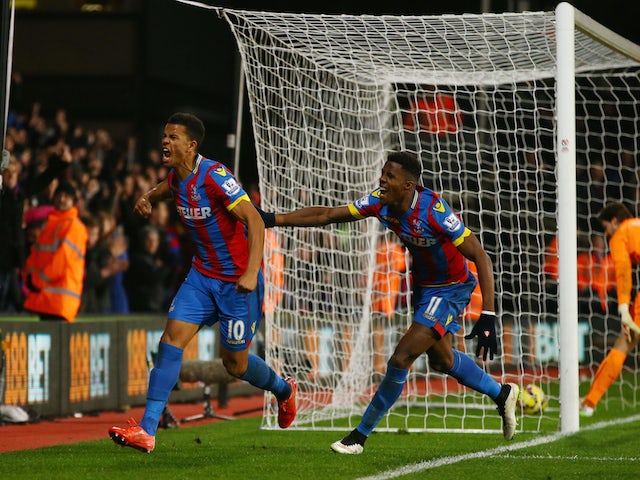 Fraizer Campbell of Crystal Palace (L) celebrates scoring their first goal during the Barclays Premier League match against Newcastle Utd on February 11, 2015