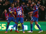 Fraizer Campbell of Crystal Palace (L) celebrates scoring the opening goal with Dwight Gayle and Marouane Chamakh during the FA Cup fifth round match against Liverpool on February 14, 2015