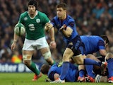 France's scrum half Rory Kockott (C) passes the ball during the Six Nations international rugby union match between Ireland and France at Aviva Stadium in Dublin, Ireland on February 14, 2015