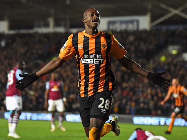 Dame N'Doye of Hull City celebrates after scoring is team's second goal during the Barclays Premier League match between Hull City and Aston Villa at the KC Stadium on February 10, 2015
