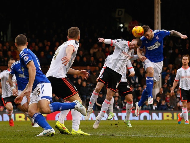 Daryl Murphy of Ipswich Town heads the ball to score his team's first goal during the Sky Bet Championship match between Fulham and Ipswich Town at Craven Cottage on February 14, 2015