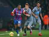 Jason Puncheon of Crystal Palace and Jack Colback of Newcastle United battle for ball during the Barclays Premier League match on February 11, 2015
