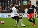 Jordan Obita of Reading takes on Jesse Lingard of Derby County during the FA Cup Fifth Round match between Derby County and Reading at iPro Stadium on February 14, 2015
