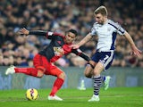 Kyle Naughton of Swansea is closed down by James Morrison of West Brom during the Barclays Premier League match on February 11, 2015