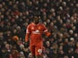 Liverpool's Italian striker Mario Balotelli gives a thumbs up after scoring Liverpool's third goal during the English Premier League football match between Liverpool and Tottenham Hotspur at the Anfield stadium in Liverpool, northwest England, on February
