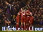 Liverpool players celebrate after Liverpool's Serbian midfielder Lazar Markovic scored the opening goal during the English Premier League football match between Liverpool and Tottenham Hotspur at the Anfield stadium in Liverpool, northwest England, on Feb