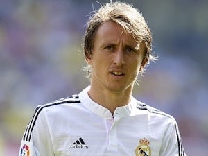 Modric "very happy" to return