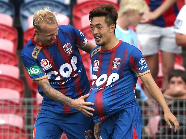  Taylor Regan and Kije Lee of the Jets celebrate a goal during the round 17 A-League match between the Newcastle Jets and the Western Sydney Wanderers at Hunter Stadium on February 14, 2015