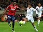 Nice's Malagasy defender Albert Rafetraniaina vies for the with Lille's Belgian forward Divock Origi during the French L1 football match between Lille (LOSC) and Nice (OGCN) on February 14, 2015