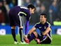 Sergio Aguero of Manchester City speaks with team-mate David Silva after picking up an injury during the Barclays Premier League match against Stoke on February 11, 2015