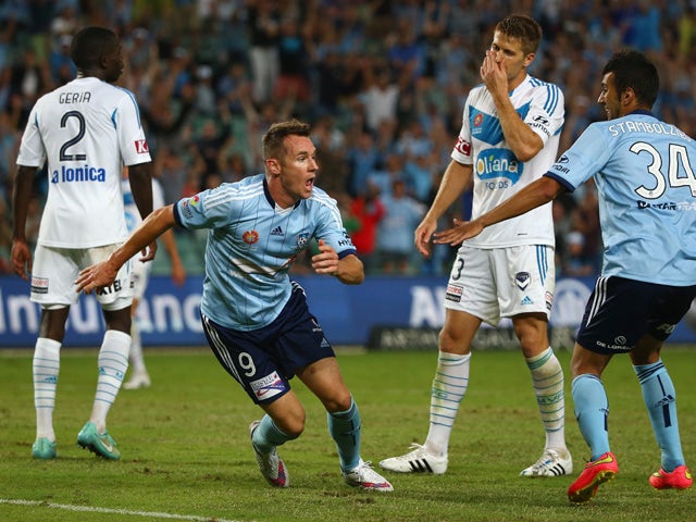 Shane Smeltz of Sydney FC celebrates after scoring his second goal during the round 17 A-League match between Sydney FC and Melbourne Victory at Allianz Stadium on February 14, 2015