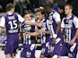 Toulouse's Italian-Argentinian midfielder Oscar Trejo celebrates with teammates after scoring a goal during the French L1 football match between Toulouse and Rennes at the Municipal Stadium in Toulouse on February 14, 2015
