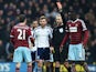 Morgan Amalfitano of West Ham United is shown a red card by referee Martin Atkinson and is sent off during the FA Cup Fifth Round match between West Bromwich Albion and West Ham United at The Hawthorns on February 14, 2015