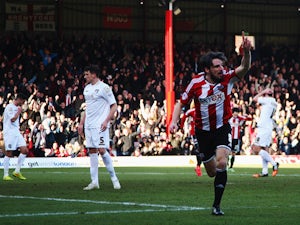 Half-Time Report: Brentford edge ahead at Griffin Park