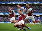 Ben Mee of Burnley celebrates after scoring a goal to level the scores at 1-1 during the Barclays Premier League match between Chelsea and Burnley at Stamford Bridge on February 21, 2015
