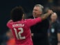 Real Madrid's Italian coach Carlo Ancelotti (R) and Real Madrid's Brazilian defender Marcelo celebrate after Marcelo scored during the last sixteen, first-leg UEFA Champions League match against Schalke on February 18, 2015