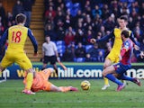 Glenn Murray of Crystal Palace (17) scores their first goal past goalkeeper David Ospina of Arsenal during the Barclays Premier League match between Crystal Palace and Arsenal at Selhurst Park on February 21, 2015