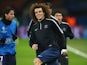 Paris Saint-Germain's David Luiz warms up ahead of the Champions League encounter with his former side Chelsea on February 17, 2015