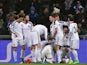 Basel teammates celebrate after Paraguayan midfielder Derlis Gonzalez (Hidden) opened the scoring during the UEFA Champions League round of 16 first leg football match against Porto on February 18, 2015