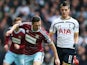 Erik Lamela of Spurs chases down West Ham's Stewart Downing on February 22, 2015