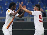Gervinho (L) with his teammate Daniele Verde of AS Roma celebrates after scoring the opening goal during the UEFA Europa League Round of 32 match against Feyenoord on February 19, 2015