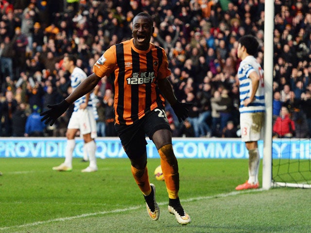 Dame N'Doye of Hull City (28) as he scores their second goal during the Barclays Premier League match between Hull City and Queens Park Rangers at KC Stadium on February 21, 2015