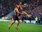Nikica Jelevic of Hull City celebrates with David Meyler as he scores their first goal during the Barclays Premier League match between Hull City and Queens Park Rangers at KC Stadium on February 21, 2015