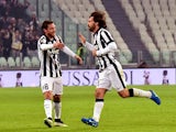 Juventus' midfielder Andrea Pirlo celebrates after scoring a goal with Juventus' midfielder Claudio Marchisio during their Serie A match Juventus vs Atalanta at Juventus Stadium in Turin on February 20, 2015