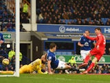 David Nugent of Leicester City scores their first and equalising goal during the Barclays Premier League match between Everton and Leicester City at Goodison Park on February 22, 2015