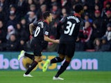 Philippe Coutinho of Liverpool celebrates after scoring the opening goal during the Barclays Premier League match between Southampton and Liverpool at St Mary's Stadium on February 22, 2015