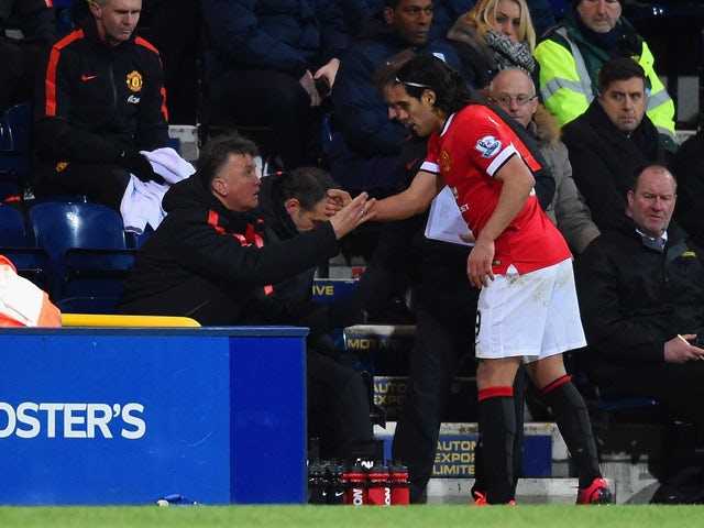 Manager Louis van Gaal of Manchester United shakes hands with Radamel Falcao of Manchester United as he is replaced during the FA Cup Fifth round match between Preston North End and Manchester United at Deepdale on February 16, 2015