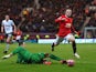 Wayne Rooney of Manchester United draws a foul from Thorsten Stuckmann of Preston North End to win a penalty during the FA Cup Fifth round match between Preston North End and Manchester United at Deepdale on February 16, 2015