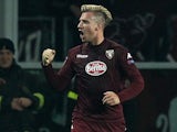 Torino's Argentinian forward Maxi Lopez celebrates after scoring during the UEFA Europe League round of 32 football match Torino Vs Athletic Bilbao on February 19, 2015