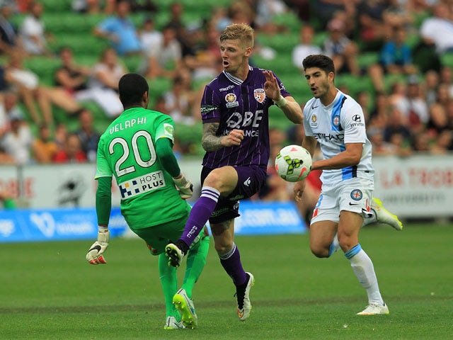 Andy Keogh (#9) of Perth Glory has his shot blocked by goalkeeper Tando Velaphi (#20) of Melbourne City during the round 18 A-League match between Melbourne City FC and Perth Glory at AAMI Park on February 22, 2015