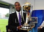 Former West Indian Cricketer, Michael Holding poses with the ICC Cricket World Cup Trophy during the England v India One Day International at The County Ground on August 25, 2014