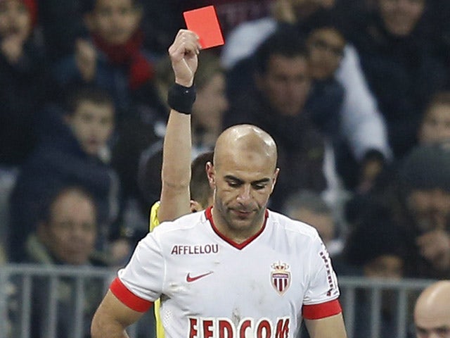 Monaco's Tunisian defender Aymen Abdennour receives a red card during the French L1 football match Nice (OGC Nice) vs Monaco (ASM) on February 20, 2015