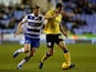 Reading's Pavel Pogrebnyak chases after Wigan's Jason Pearce on February 17, 2015