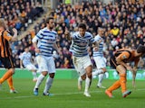 Charlie Austin of QPR celebrates as he scores their first and equalising goal during the Barclays Premier League match between Hull City and Queens Park Rangers at KC Stadium on February 21, 2015