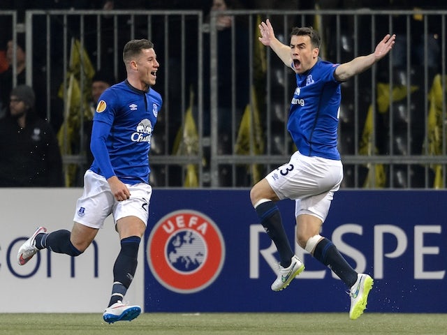 Everton's Irish defender Seamas Coleman (R) celebrates the team's second goal next to teammate English midfielder Ross Barkley during the EUFA Europa League football match against Young Boys on February 19, 2015