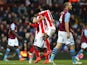 Mame Biram Diouf of Stoke City celebrates scoring their first goal with Victor Moses of Stoke City during the Barclays Premier League match between Aston Villa and Stoke City at Villa Park on February 21, 2015