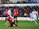 Swansea player Ki Sung-Yueng scores the first Swansea goal during the Barclays Premier League match between Swansea City and Manchester United at Liberty Stadium on February 21, 2015