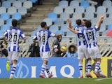 Xabi Prieto is mobbed by a herd of Real Sociedad teammates after scoring on February 22, 2015