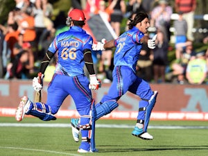 Rain restricts Afghanistan to 111-7