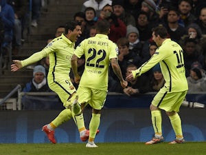 Half-Time Report: Suarez puts Barcelona in control
