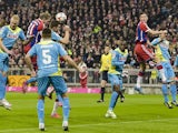 Bayern Munich's midfielder Bastian Schweinsteiger jumps to score the first goal during the German first division Bundesliga football match FC Bayern Muenchen vs 1 FC Koeln in Munich, southern Germany, on February 27, 2015