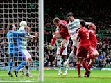 Celtic player Jason Denayer heads the opening goal during the Scottish Premiership match between Celtic and Aberdeen at Celtic Park Stadium on March 1, 2015